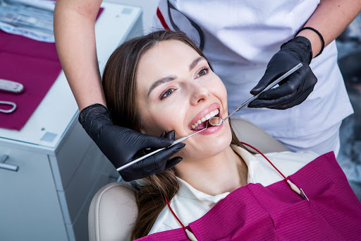 Patient receiving a professional dental cleaning at a Toronto dental office